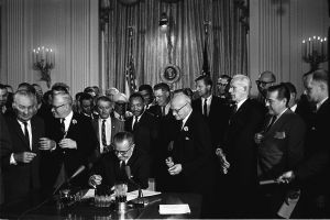 Lyndon_Johnson_signing_Civil_Rights_Act,_July_2,_1964 Cecil Stoughton, White House Press Office (WHPO)