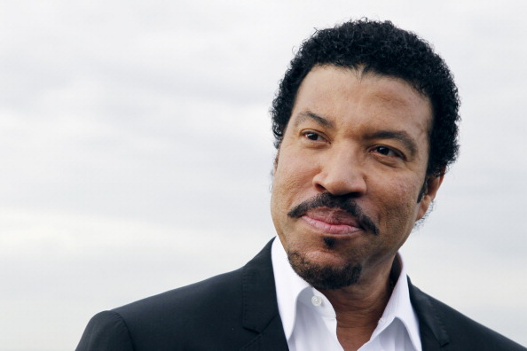 US singer Lionel Richie poses in front o