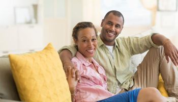 Black couple on couch