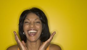 Mature woman laughing, close-up