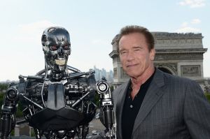 PARIS, FRANCE - JUNE 19:  Actor Arnold Schwarzenegger poses with Endoskeleton during the France Photocall of 'Terminator Genisys' at the Publicis Champs Elysees on June 19, 2015 in Paris, France.  (Photo by Dominique Charriau/Getty Images for Paramount Pictures)