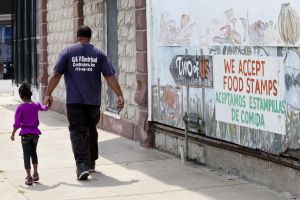 Suburban poverty is a result of the weak economy and people fleeing violence in cities like Chicago