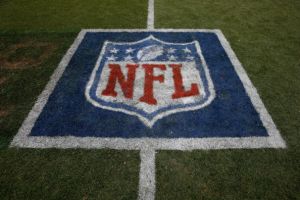 DENVER, CO - SEPTEMBER 14:  The NFL logo is displayed on the turf as the Denver Broncos defeated the Kansas City Chiefs 24-17 at Sports Authority Field at Mile High on September 14, 2014 in Denver, Colorado.  (Photo by Doug Pensinger/Getty Images)