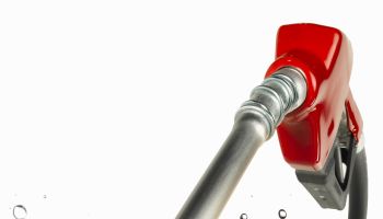Gasoline pump handle with gas pouring out (Digital Composite)