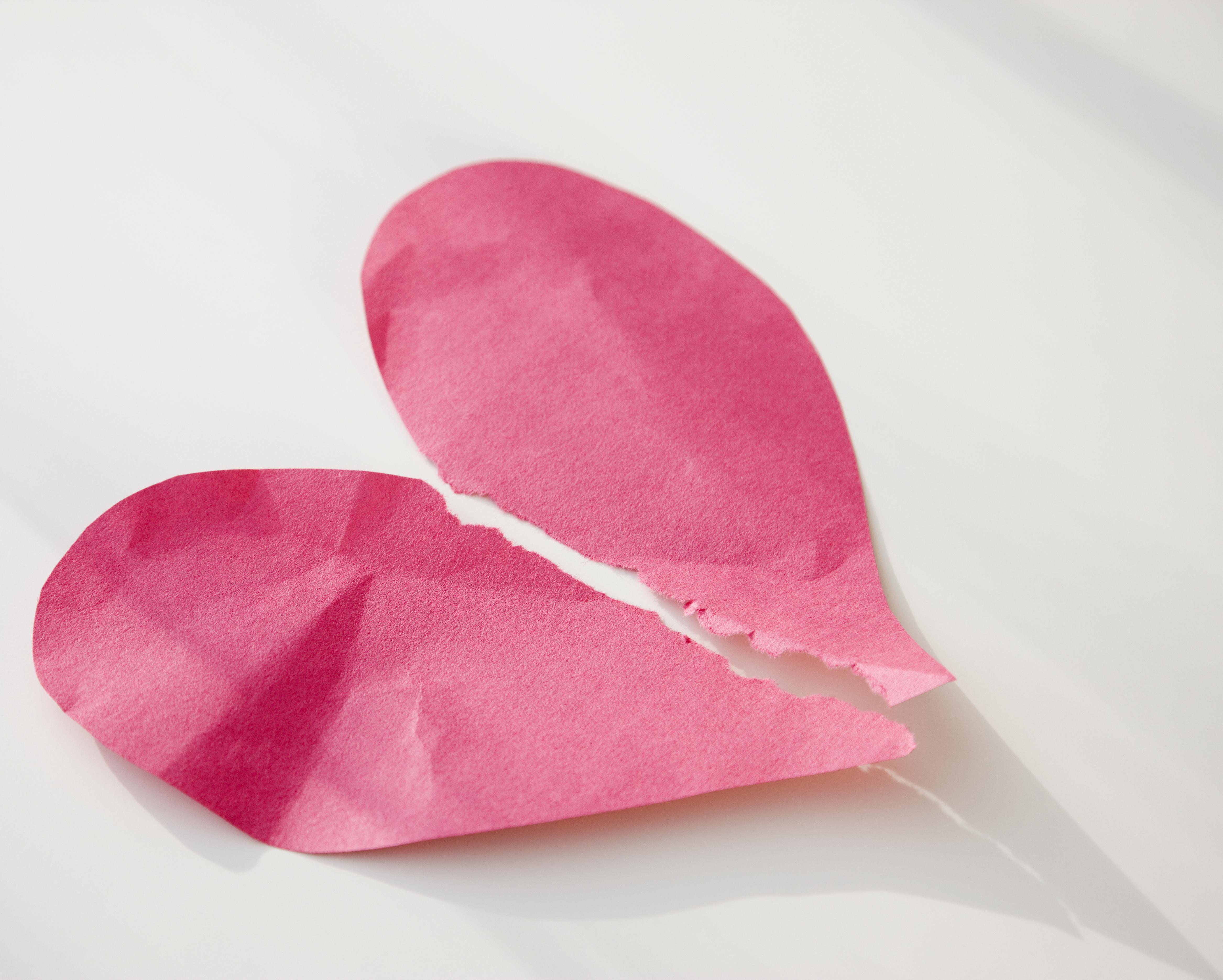 Paper heart ripped in half