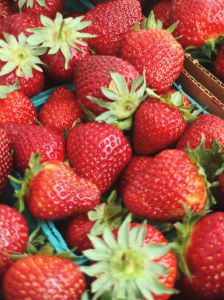 Full Frame Shot Of Strawberries For Sale At Market Stall