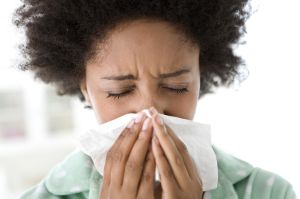 Woman Blowing Her Nose