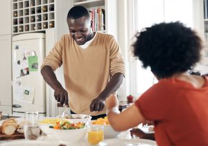 Dad will always help mom i the kitchen
