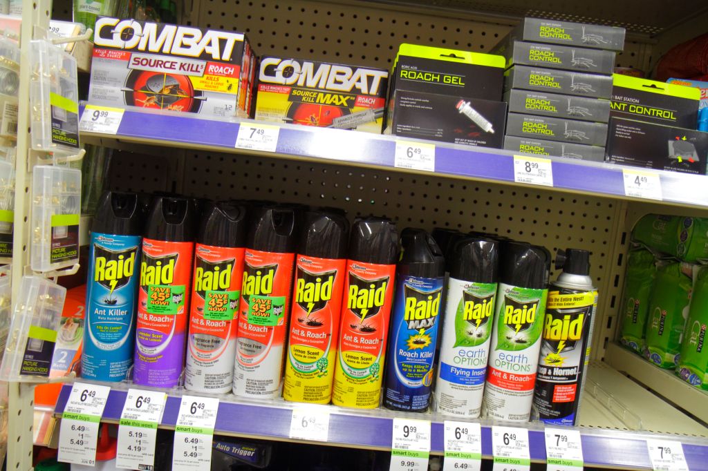 Shelves of bug spray for sale at Walgreens pharmacy.