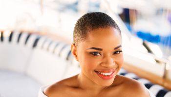 Beauty portrait of black woman on yacht