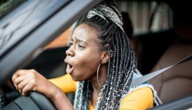 Portrait of Stressed African Woman In Car