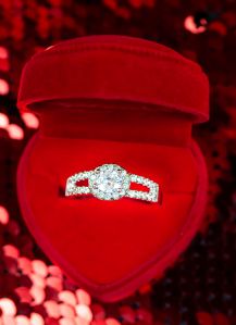 Close-Up Of Engagement Diamond Ring In Red Jewelry Box