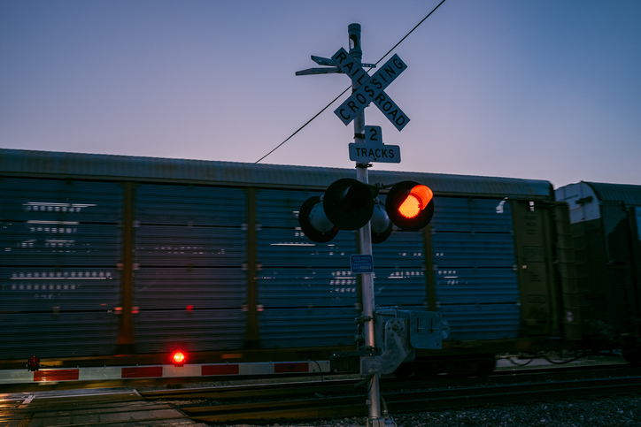 Low Angle View Of Road Sign Against Clear Sky At Dusk