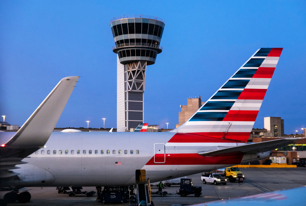 Air traffic control tower at busy airport...