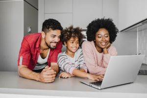 African American family using laptop