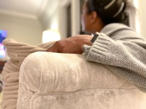 african-american woman watching television