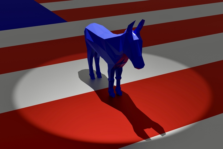 Democratic Blue Donkey in Spotlight on Top of American Flag