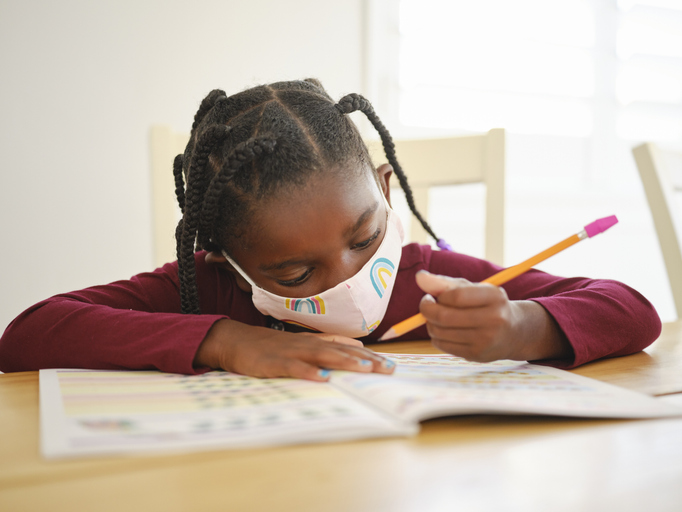An Elementary School Student in a Classroom