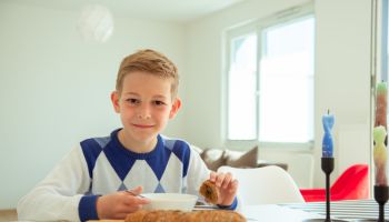 Portrait Of Boy On Table