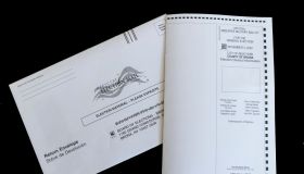 In this photo illustration an absentee mail-in ballot for...