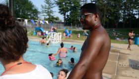 Arrindell pauses at one of the chairs to talk to a fellow lifeguard.Wensy Arrindell, a manager at Schlegel Park pool, helps the lifeguards keep hundreds of swimmers safe daily. Summer Jobs story. Photo by Jeremy Drey 6/30/2017