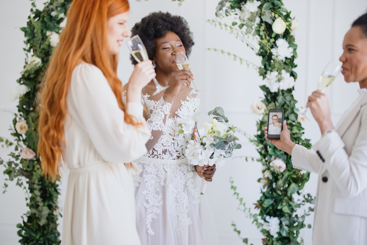 Bride talking to her friend via video call