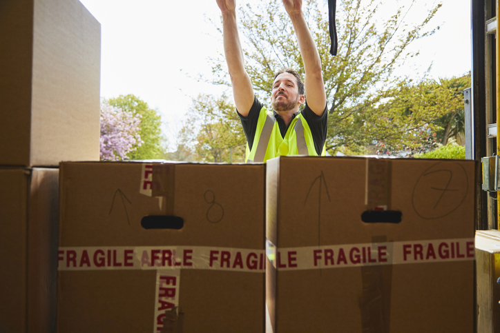 removal man with van and boxes.