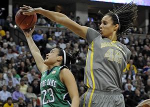 Baylor Bears center Brittney Griner blocks a shot by Notre Dame's Kayla McBride during the first half of play in NCAA Women's 2012 National Championship action at the Pepsi Center in Denver, CO Tuesday April 3, 2012. AAron Ontiveroz/The Denver Post