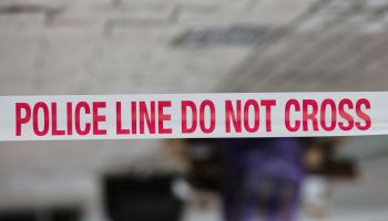 A police tape around a crime scene...