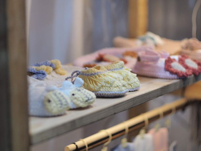 Baby Booties On Shelf For Sale At Store
