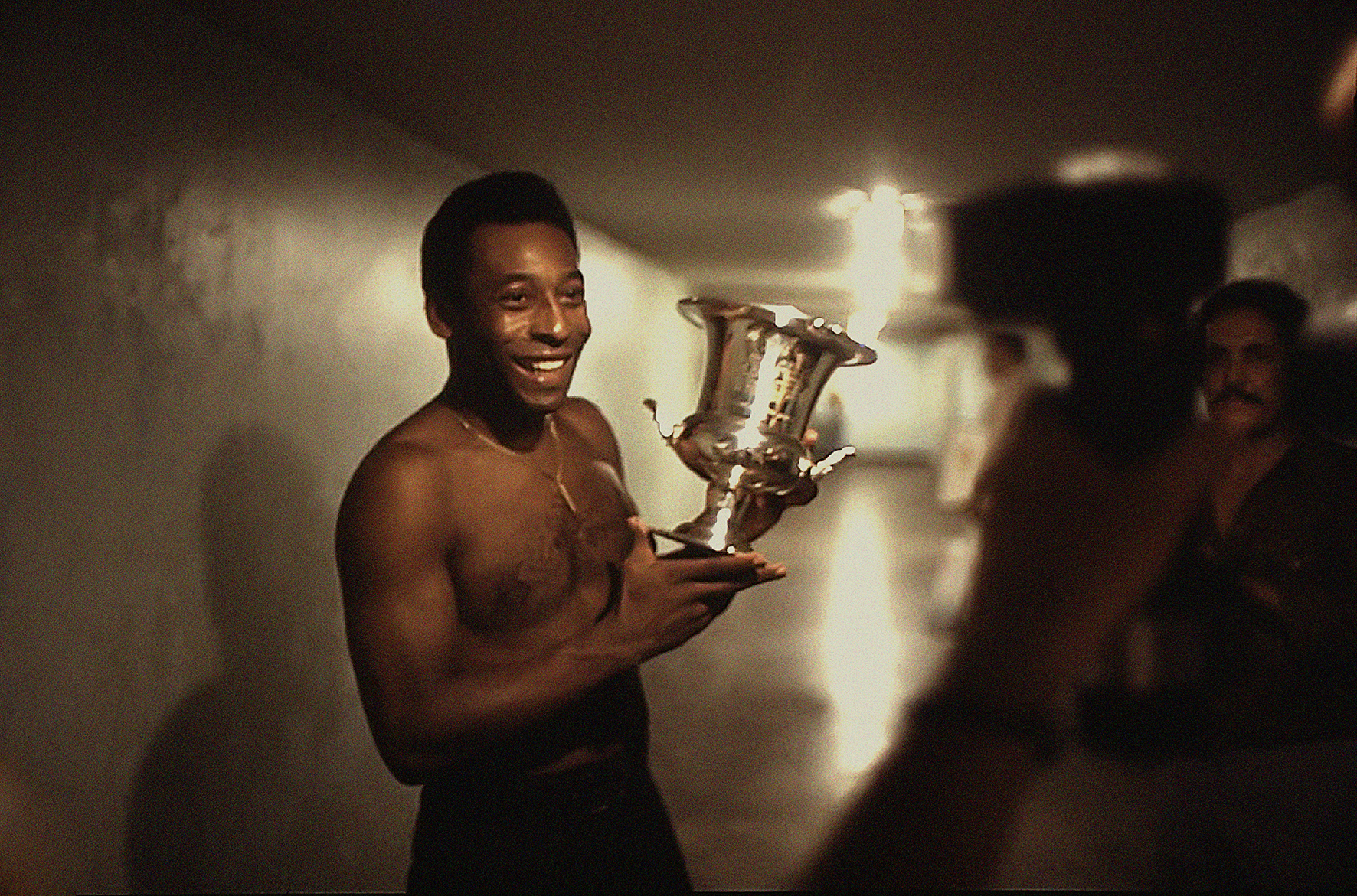 Pelé Of Cosmos Poses With A Trophy