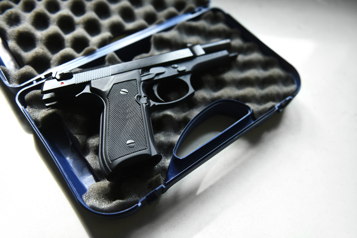 Beretta handgun for hire