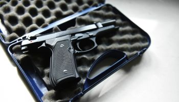 Beretta handgun for hire