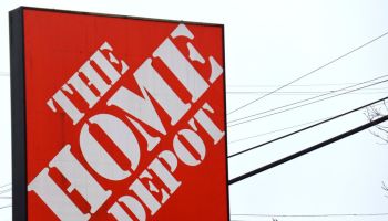 The logo of Home Depot is seen on a signboard near its store...