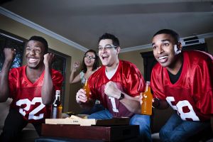 friends watching football on TV