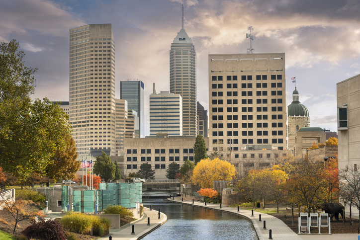 Downtown city skyline view of Indianapolis, Indiana, USA looking over the Central Canal Walk
