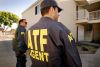 ATF Search warrants. ATF agents Rick Verducci (left) and Joe Mokos (right) after conducting a feder