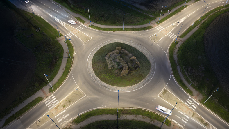 traffic roundabout in the night aerial view