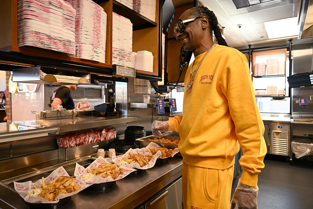 Snoop Dogg Works Surprise "Shift" at Raising Cane's in Vegas Ahead of National Chicken Finger Day on July 27
