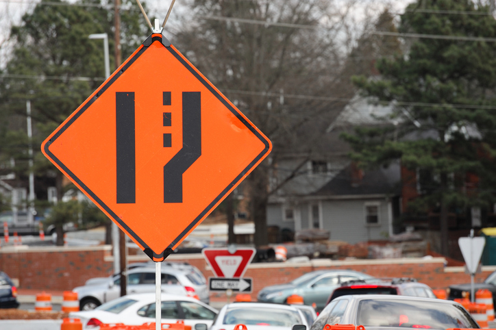 road merge sign in road construction site